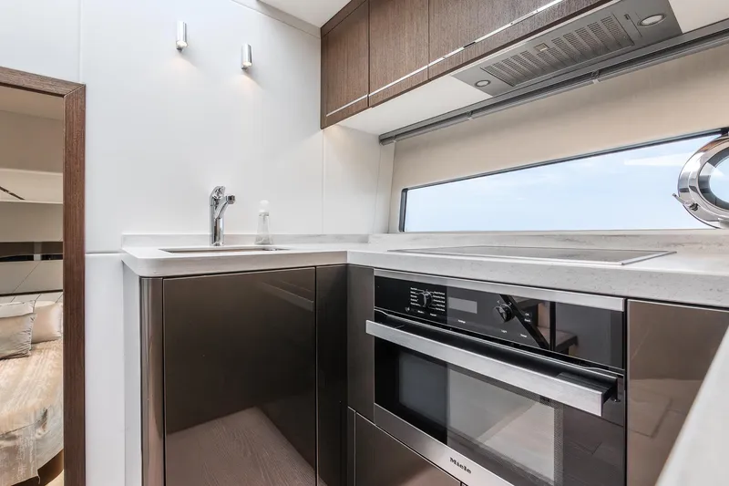 Slide: The Image of Modern kitchen interior of 2021 Sunseeker 60 Evo yacht with sleek appliances. - 33