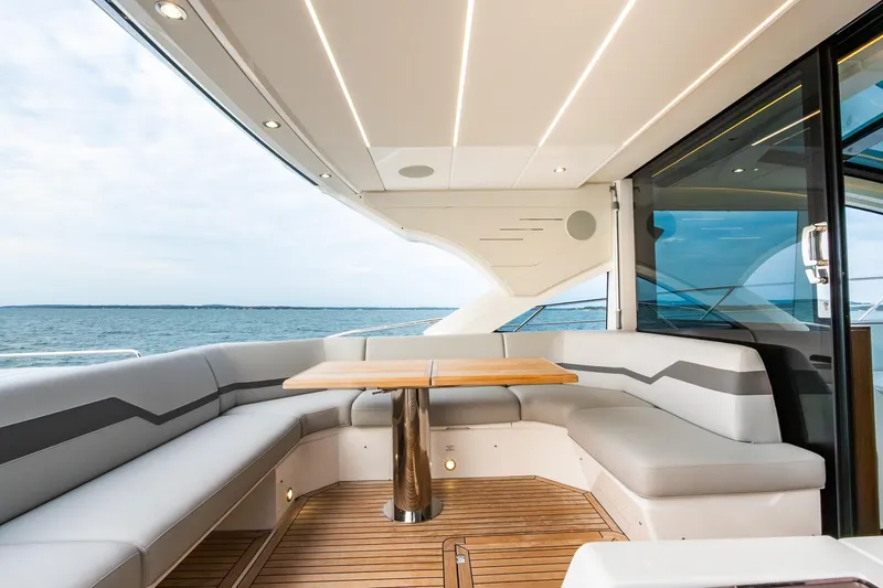Slide: The Image of Luxurious Sunseeker 60 Evo yacht deck with elegant seating and ocean view, 2021 model. - 41
