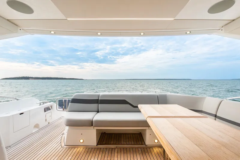 Slide: The Image of Luxury Sunseeker 60 Evo yacht deck with ocean view, 2021 model. - 46