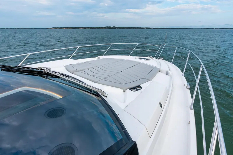 Slide: The Image of Sunseeker 60 Evo 2021 yacht deck with ocean view and sleek design. - 72
