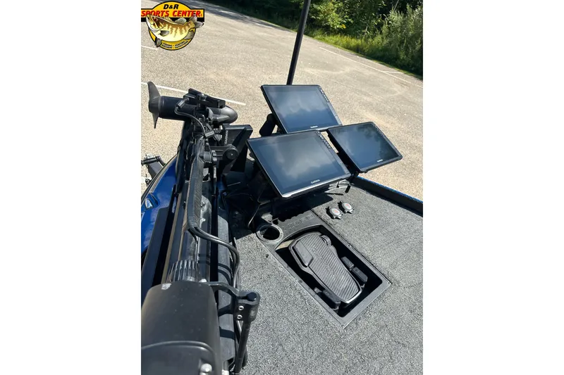 Slide: The Image of 2024 Nitro Z21 XL boat dashboard with multiple screens and controls. - 10