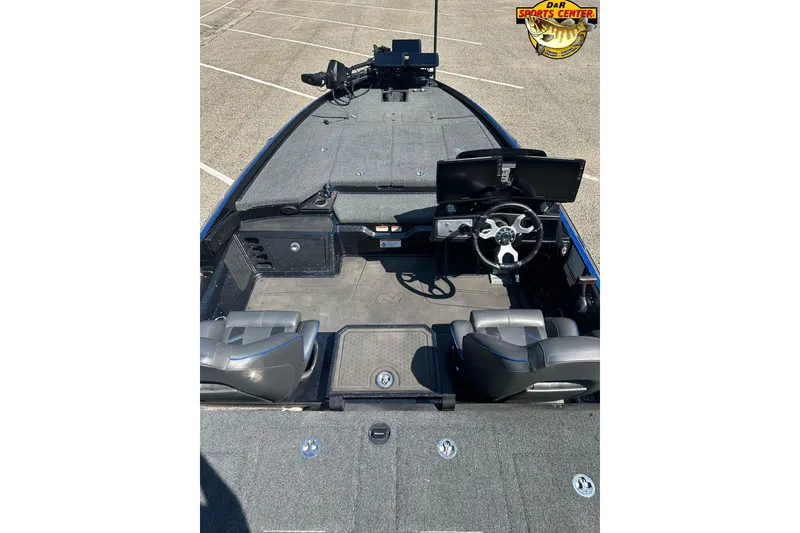 Slide: The Image of 2024 Nitro Z21 XL boat interior with dual seats and steering console. - 12