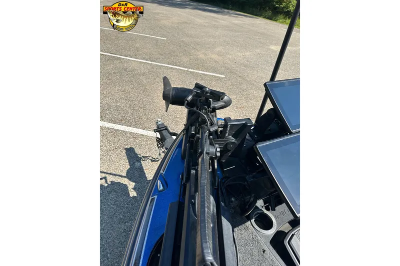 Slide: The Image of 2024 Nitro Z21 XL boat with advanced navigation equipment in a parking lot. - 8