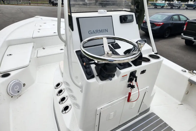 Slide: The Image of Center console of 2019 BlackJack 224 boat with Garmin navigation system. - 10