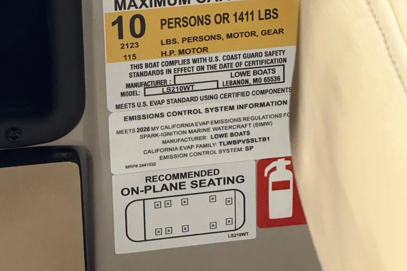 Slide: The Image of Label on Lowe LS 210 boat, 2026 model, showing capacity and safety information. - 11