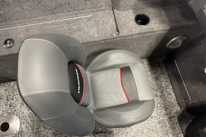 Slide: The Image of 2025 Tracker Pro Guide V-175 Combo boat seat, gray upholstery, modern design. - 12