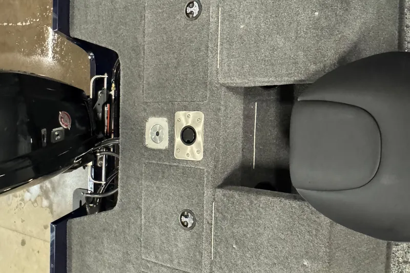 Slide: The Image of 2025 Tracker Pro Guide V-175 Combo boat interior with motor and seating. - 20