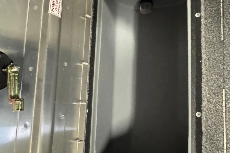 Slide: The Image of Interior view of 2025 Tracker Pro Guide V-175 Combo boat compartment. - 21