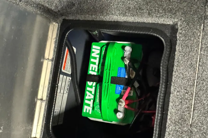 Slide: The Image of Battery compartment of 2025 Tracker Pro Guide V-175 Combo boat. - 22