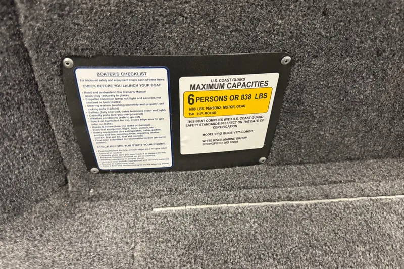 Slide: The Image of 2025 Tracker Pro Guide V-175 Combo capacity label, 6 persons or 838 lbs, safety checklist. - 9