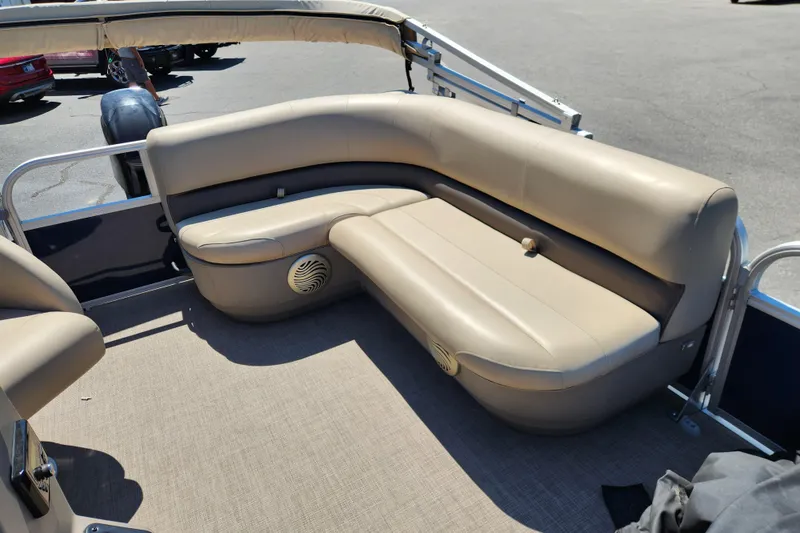 Slide: The Image of 2023 Sun Tracker Bass Buggy 16 XL Select pontoon boat with beige seating. - 8