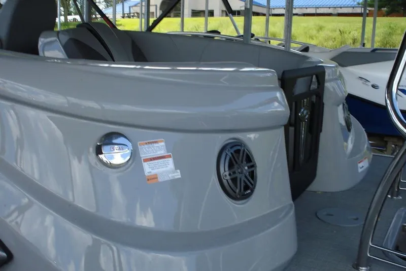 Slide: The Image of 2024 Manitou LX 25 Rear Facing X-Treme boat, featuring sleek design and modern amenities. - 11