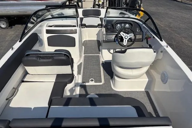 Slide: The Image of 2021 Bayliner VR5 Bowrider I/O interior with sleek seating and modern dashboard design. - 11