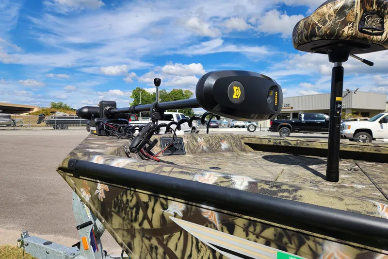 Slide: The Image of 2024 Ranger RB200 boat with camouflage design and advanced trolling motor. - 9