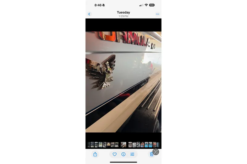 Slide: The Image of 2005 Formula 260 Bowrider boat bathroom with sink, toilet, and storage items. - 10