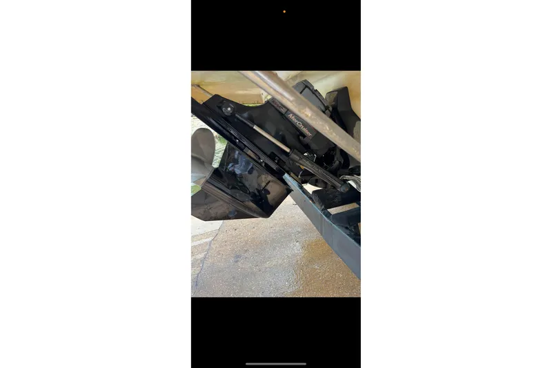 Slide: The Image of Dashboard of a 2005 Formula 260 Bowrider boat with wood accents and gauges. - 11