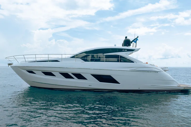 Slide: The Image of Luxurious 2019 Filippetti S55 yacht cruising on calm waters under a cloudy sky. - 0