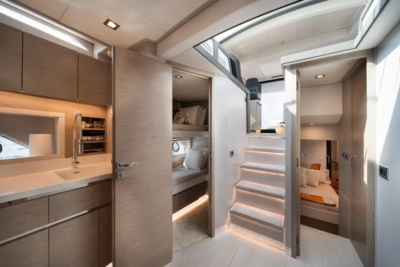 Slide: The Image of Luxurious interior of 2019 Filippetti S55 yacht with modern kitchen and cozy cabins. - 1