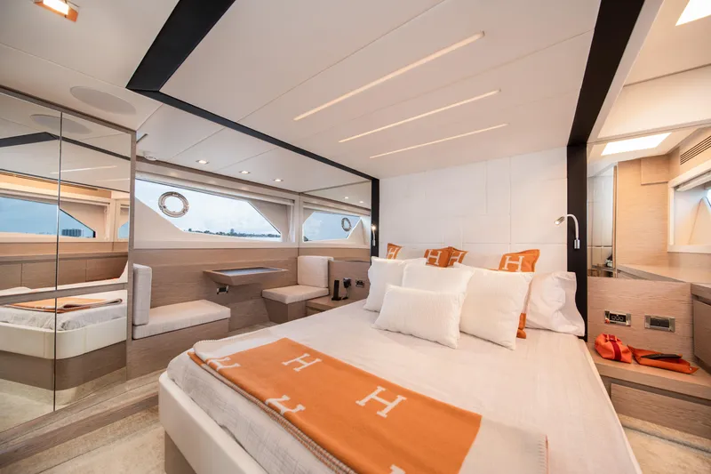 Slide: The Image of Luxurious 2019 Filippetti S55 yacht bedroom with modern design and elegant decor. - 13