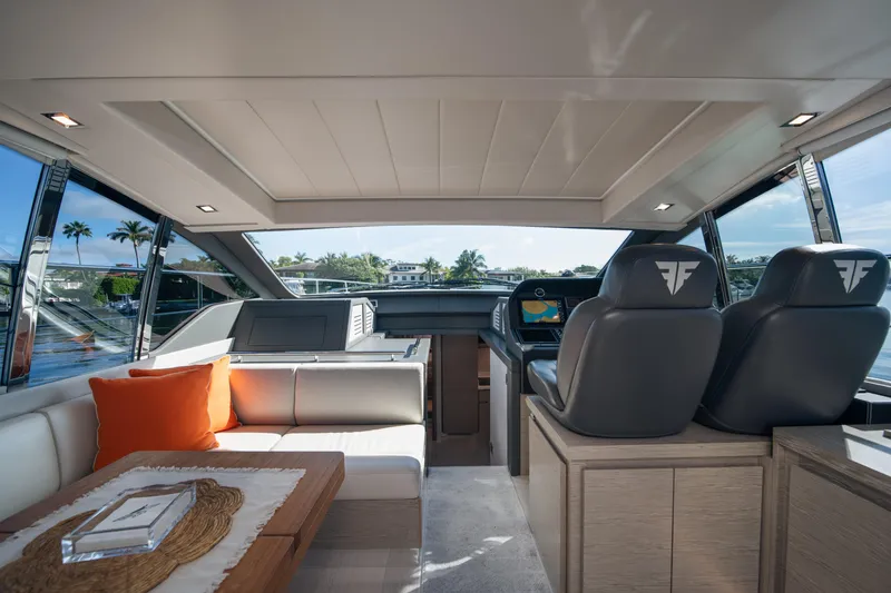 Slide: The Image of Luxurious interior of 2019 Filippetti S55 yacht with modern seating and navigation area. - 6