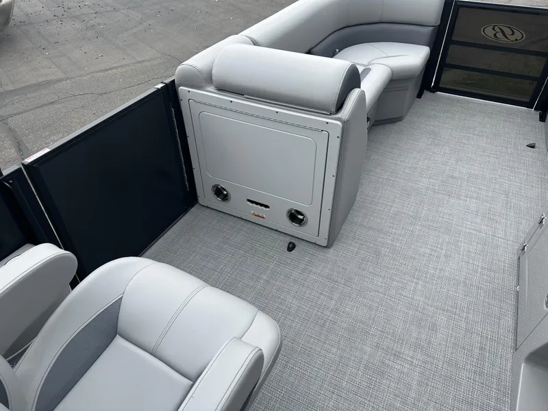 Slide: The Image of 2025 Bentley Pontoons Legacy 220 Navigator interior with gray seating and carpet flooring. - 16