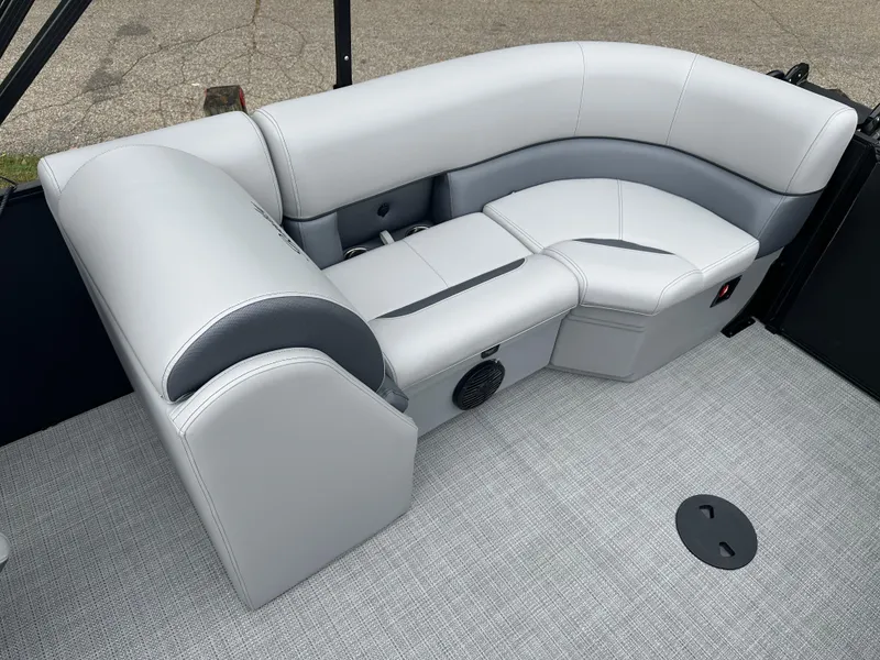 Slide: The Image of 2025 Bentley Pontoons Legacy 220 Navigator interior seating, featuring sleek gray upholstery and modern design. - 19