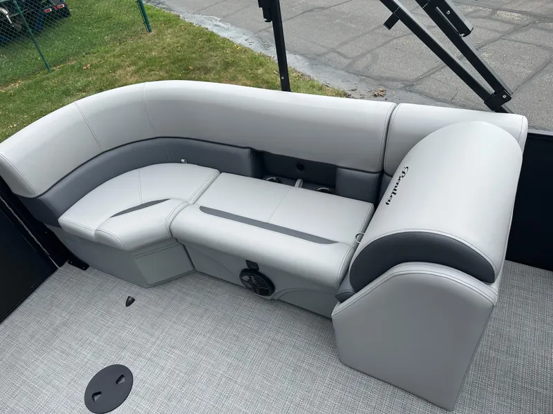 Slide: The Image of 2025 Bentley Pontoons Legacy 220 Navigator interior seating, featuring sleek gray upholstery. - 20