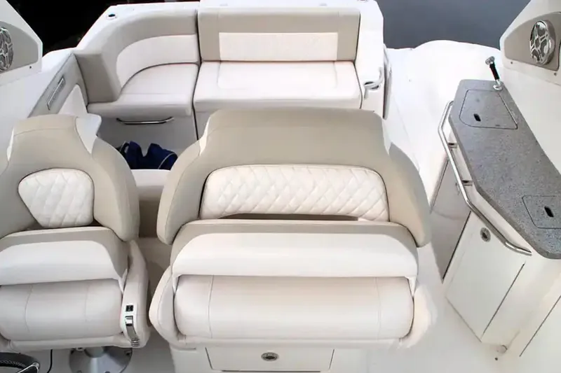 Slide: The Image of 2017 Chaparral 310 Signature boat interior with plush seating and sleek design. - 17