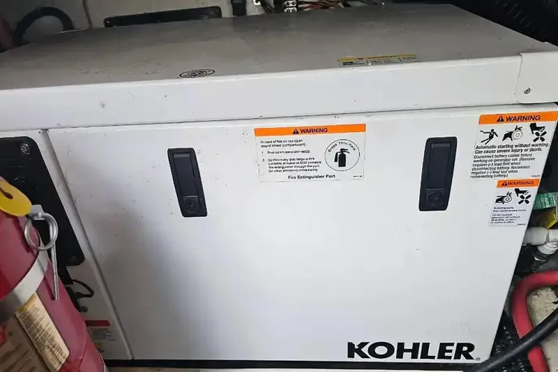 Slide: The Image of Kohler generator in 2017 Chaparral 310 Signature boat engine compartment. - 43