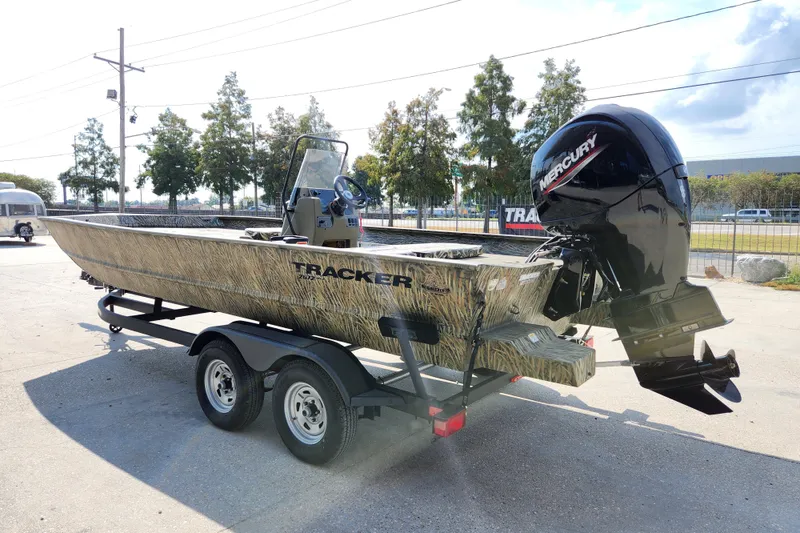 Slide: The Image of 2025 Tracker Grizzly 2072 CC boat with Mercury engine on trailer. - 6