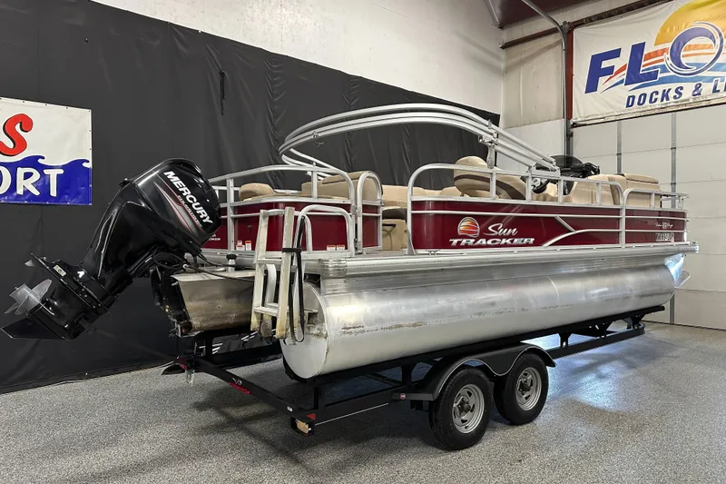 Slide: The Image of 2018 Sun Tracker SFB20 pontoon boat with Mercury outboard motor on trailer. - 9