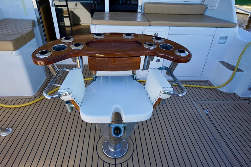 Slide: The Image of Luxury fishing chair on 2000 Venturer 44 yacht deck with rod holders. - 100