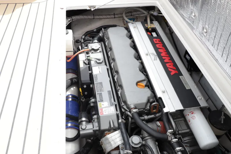 Slide: The Image of Engine compartment of a 2000 Venturer 44 boat with Yanmar engine. - 106