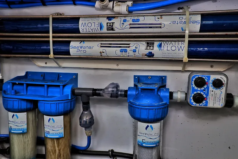 Slide: The Image of Water filtration system on Venturer 44, 2000 model, featuring SeaWater Pro components. - 110