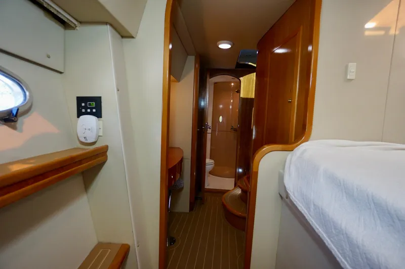 Slide: The Image of Interior of 2000 Venturer 44 yacht, featuring cozy cabin and modern amenities. - 70