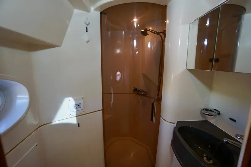 Slide: The Image of Bathroom interior of 2000 Venturer 44 yacht with shower and sink. - 72