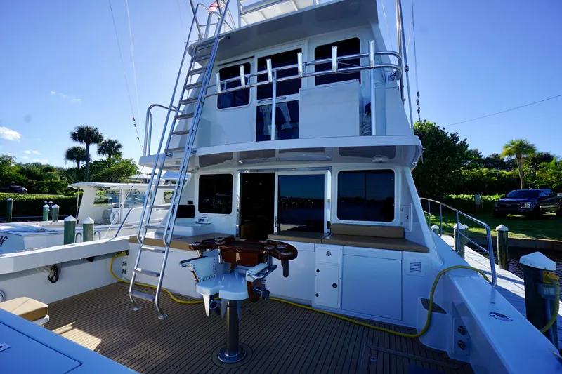 Slide: The Image of Luxury Venturer 44 yacht from 2000, featuring spacious deck and modern amenities. - 79