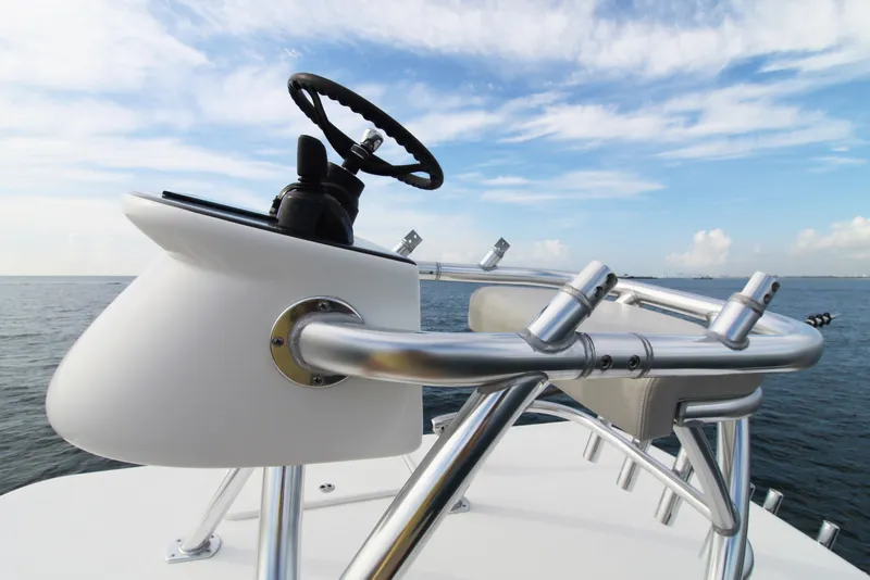 Slide: The Image of 2019 Jupiter 30 HFS boat helm with ocean backdrop and clear sky. - 16