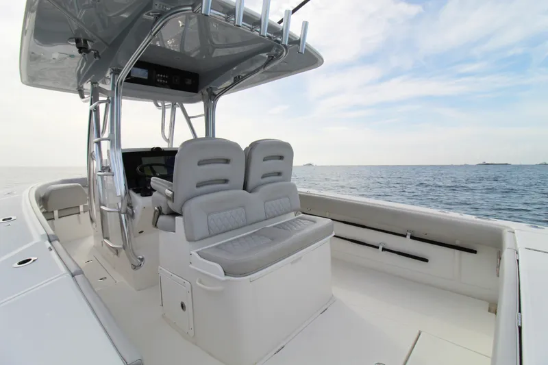 Slide: The Image of 2019 Jupiter 30 HFS boat interior with dual seats and ocean view. - 7