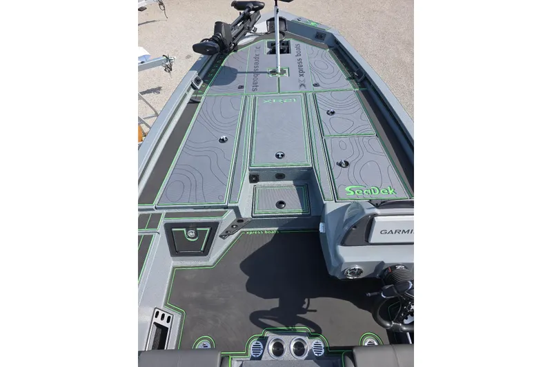 Slide: The Image of 2026 Xpress XR21 boat deck with SeaDek flooring and Garmin equipment. - 10