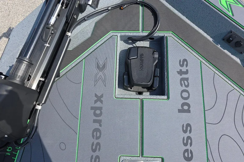 Slide: The Image of Deck of 2026 Xpress XR21 boat with pedal and branding. - 14