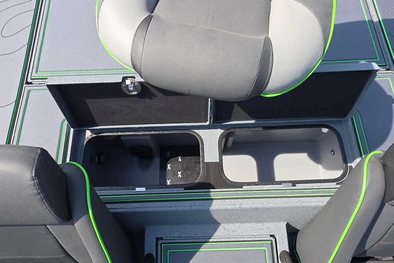 Slide: The Image of 2026 Xpress XR21 boat interior with storage compartments and cushioned seats. - 27