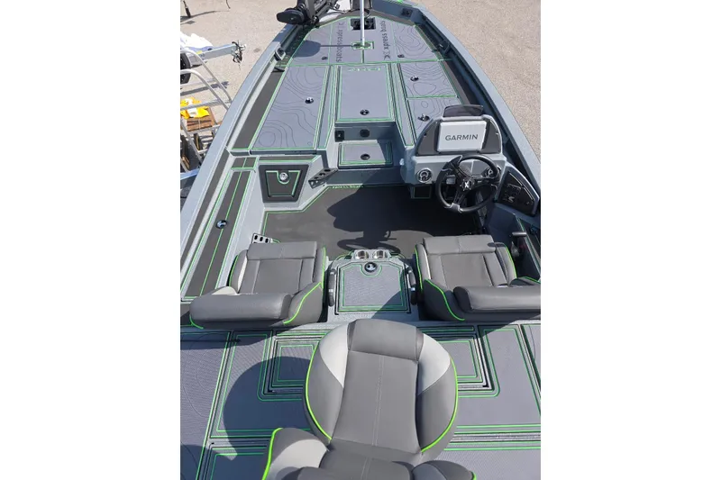 Slide: The Image of 2026 Xpress XR21 boat interior with Garmin system, featuring sleek seating and modern design. - 9