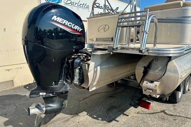 Slide: The Image of 2020 Avalon 220 Cruise pontoon boat with Mercury outboard motor. - 4