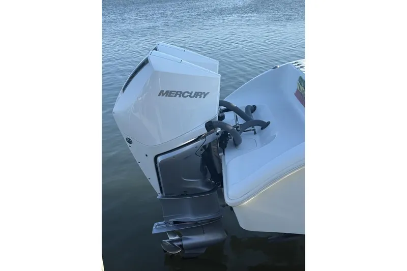 Slide: The Image of 2017 Yellowfin 32 Offshore boat with Mercury outboard motor on calm water. - 6