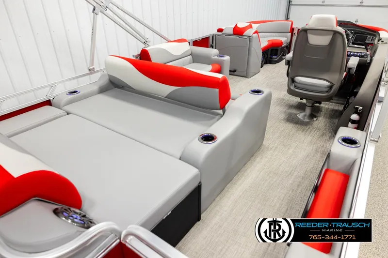 Slide: The Image of 2026 Avalon LSZ Vrl pontoon boat interior with red and gray seating, modern design. - 12