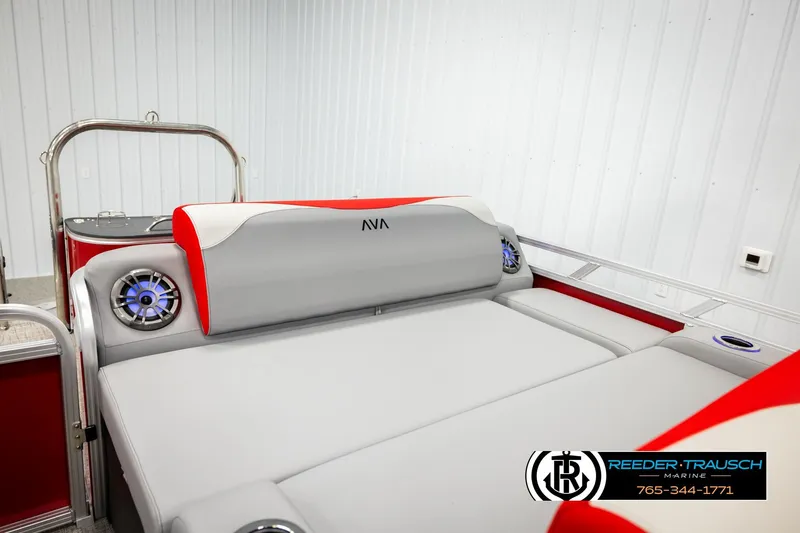 Slide: The Image of 2026 Avalon LSZ Vrl boat interior with gray and red seating, featuring built-in speakers. - 25