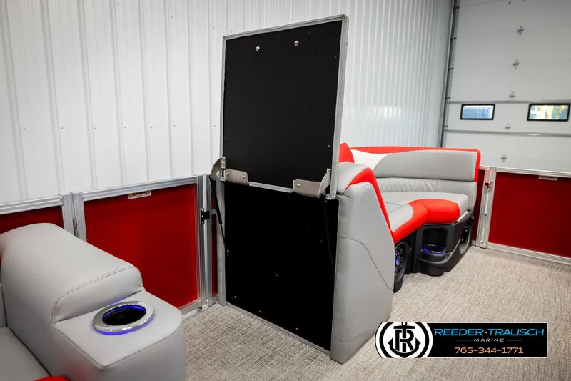 Slide: The Image of 2026 Avalon LSZ Vrl interior with red and gray seating, cup holders, and modern design. - 28