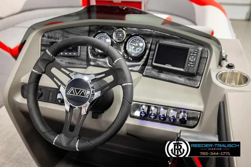 Slide: The Image of 2026 Avalon LSZ Vrl boat dashboard with steering wheel, gauges, and navigation system. - 31