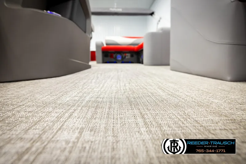 Slide: The Image of 2026 Avalon LSZ Vrl interior with modern flooring and seating, Reeder-Trausch Marine logo visible. - 47